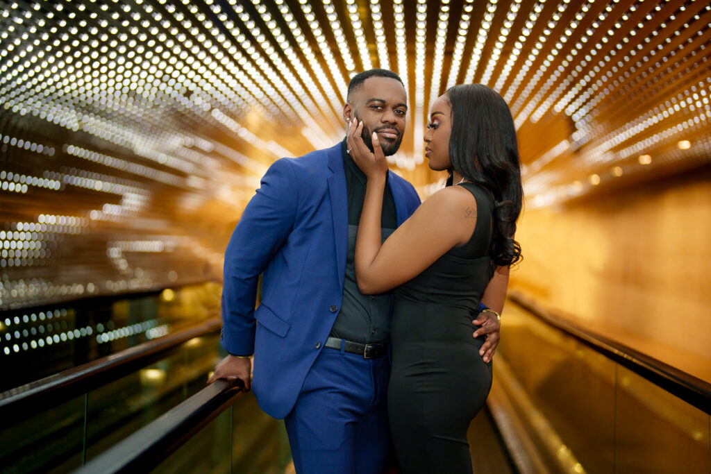 Black couple pose for engagement photoshoot National Gallery of Art Leo Villareal programs Multiverse walkway